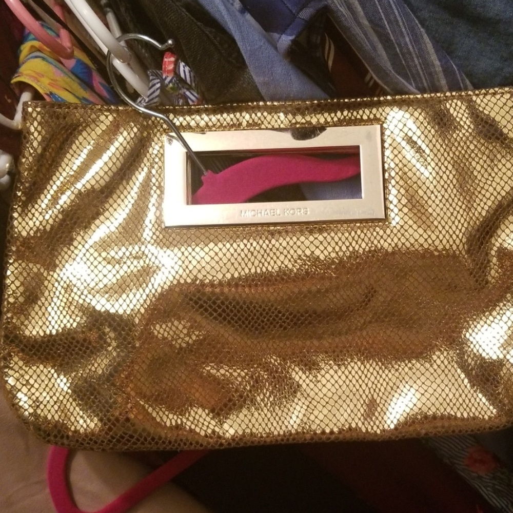 Mk gold clutch